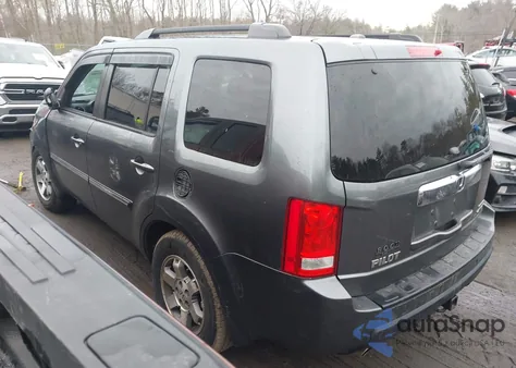 2010 Honda Pilot Touring z USA, uszkodzony, nr VIN 5FNYF4H8XAB004756